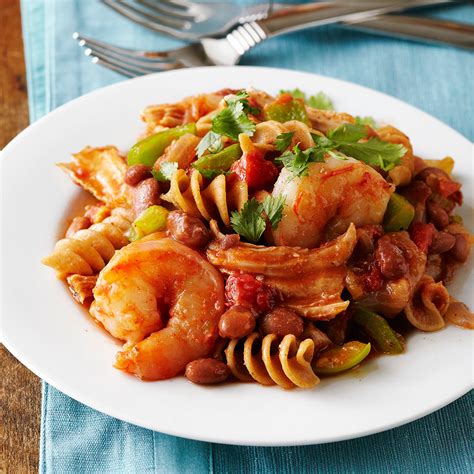 cajun-style-pork-and-shrimp-pasta-eatingwell image