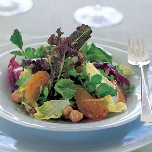 salad-of-fall-greens-with-persimmons-and-hazelnuts image
