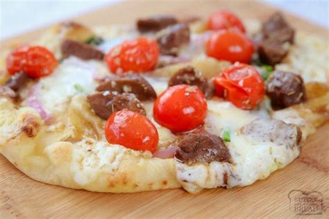 steak-and-cheese-flatbread-butter-with-a-side-of-bread image