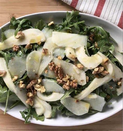 pear-arugula-salad-recipe-with-toasted-walnuts image
