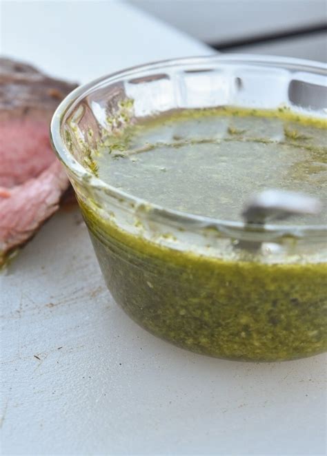 flank-steak-with-chimichurri-sauce-with-two-spoons image