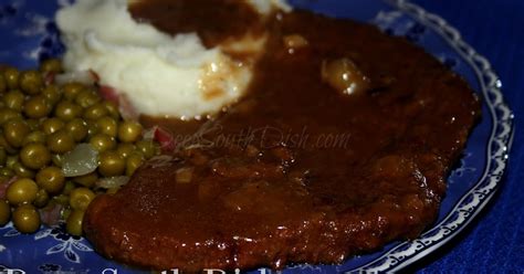 steak-and-gravy-with-onion-deep-south-dish image