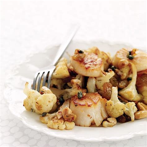 seared-scallops-with-cauliflower-capers-and-raisins image