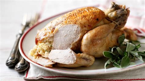 roast-chicken-and-stuffing-recipe-bbc-food image
