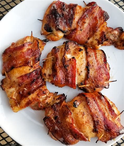 bbq-bacon-wrapped-chicken-thighs-amanda-cooks image