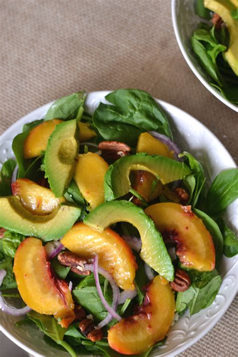 grilled-avocado-and-peach-spinach-salad image