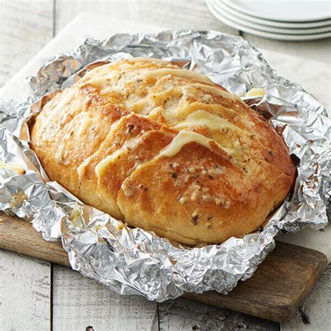 cheesy-grilled-garlic-herb-bread-recipe-land-olakes image