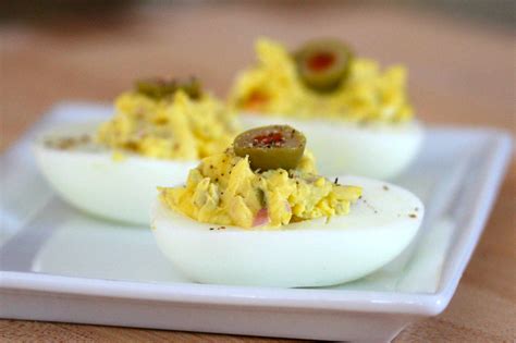 deviled-eggs-with-olives-classic image