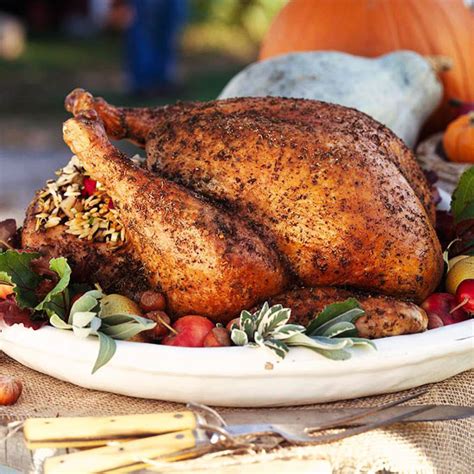 herb-rubbed-turkey-with-pear-stuffing-better-homes image