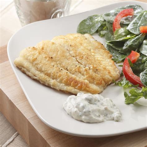 fish-fillets-with-tartar-sauce-eatingwell image