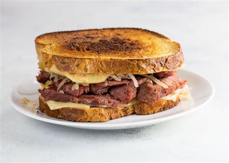 corned-beef-on-rye-reuben-sandwich-umami-girl image