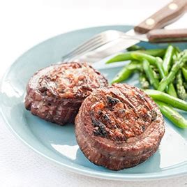 charcoal-grilled-stuffed-flank-steak image