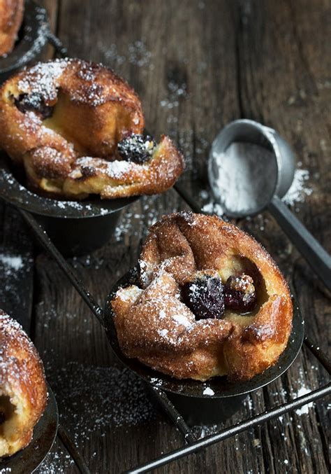 sugar-crusted-blackberry-popovers-seasons-and-suppers image