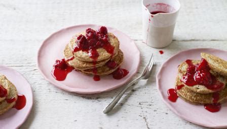 oat-pancakes-with-raspberries-and-honey-recipe-bbc-food image