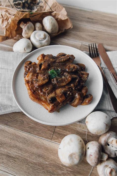 pork-chop-in-garlic-mushroom-sauce-sweet-peas image