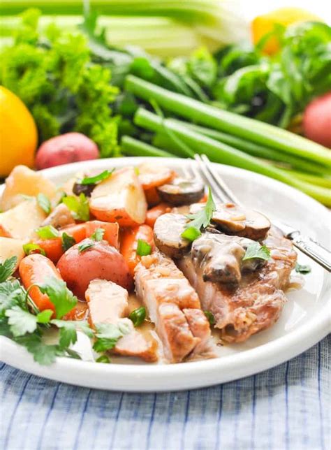 slow-cooker-pork-chops-with-vegetables-and-gravy image