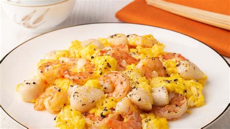 scrambled-eggs-with-truffle-scallops-and-shrimps image