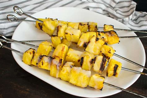 grilled-pineapple-with-coconut-rum-sauce image