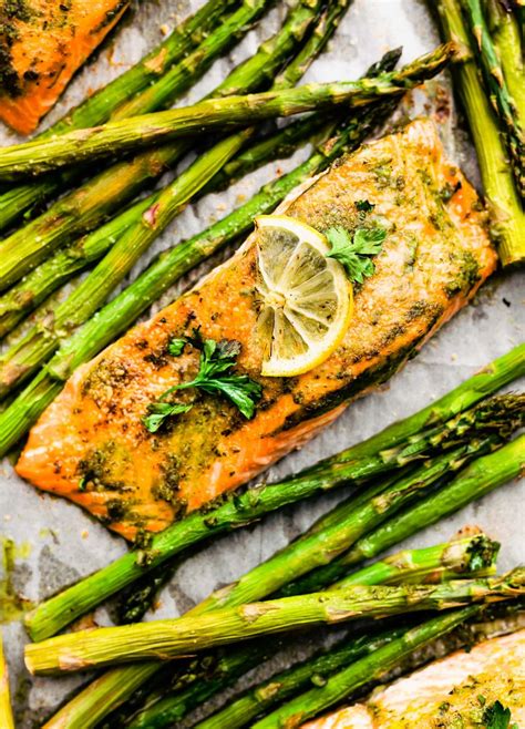 baked-salmon-and-asparagus-with-herb-sauce image