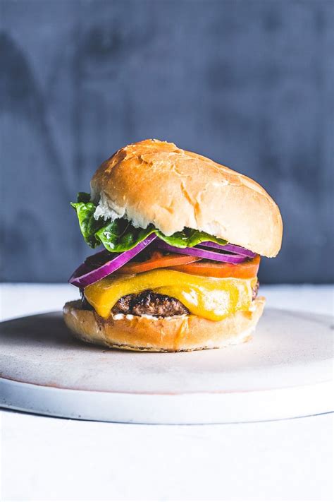 juicy-delicious-bison-burger-recipe-salt-pepper image