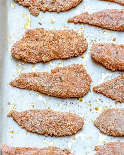 oven-fried-chicken-tenders-recipe-healthy-fitness-meals image