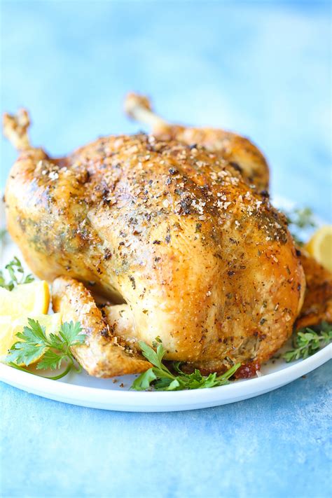 lemon-herb-roasted-chicken-damn-delicious image