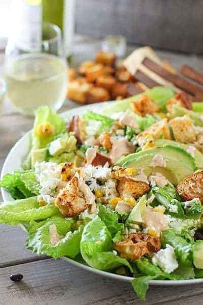 chipotle-caesar-salad-with-spicy-croutons-laughing image