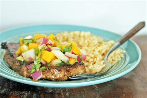 pan-fried-curried-jerk-pork-chops-with-mango-salsa image