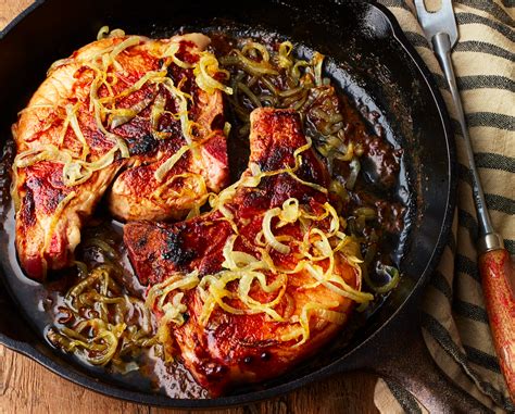 pickled-and-smothered-pork-chops-recipe-food-republic image
