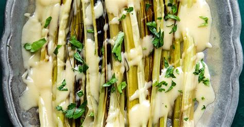 braised-leeks-with-beurre-blanc-french-butter-sauce image