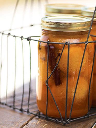 pickled-peaches-recipe-country-living image