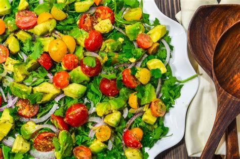 avocado-salad-with-tomatoes-arugula-and-toasted image