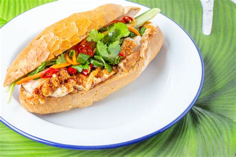 vietnamese-bread-roll-banh-mi-with-crispy-roast-pork image