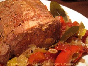 loin-of-pork-braised-in-red-wine-with-red-peppers image
