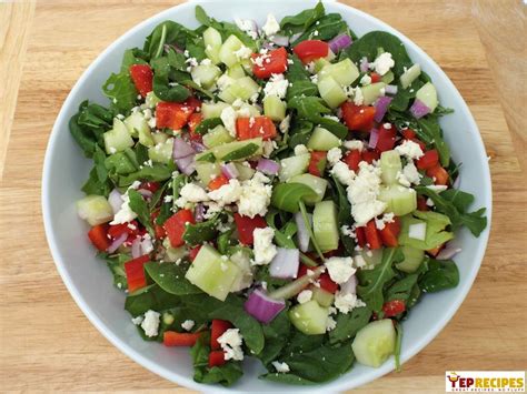 mediterranean-spinach-and-arugula-salad image