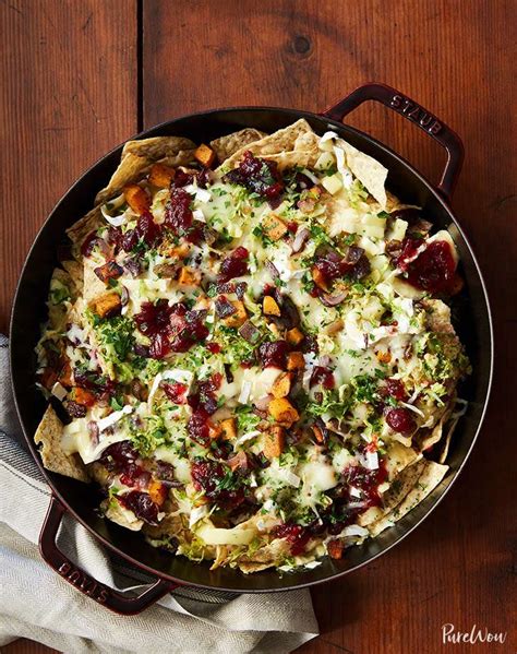 cranberry-brussels-sprouts-and-brie-skillet-nachos image