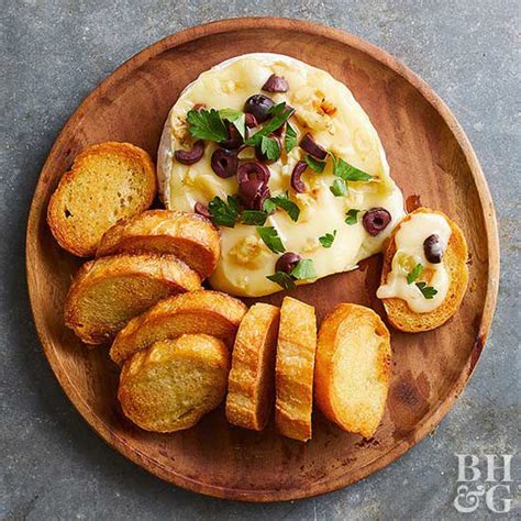 baked-brie-with-roasted-garlic-better-homes-gardens image