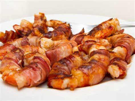 bacon-wrapped-grilled-shrimp-stuffed-with-spicy-cheese image