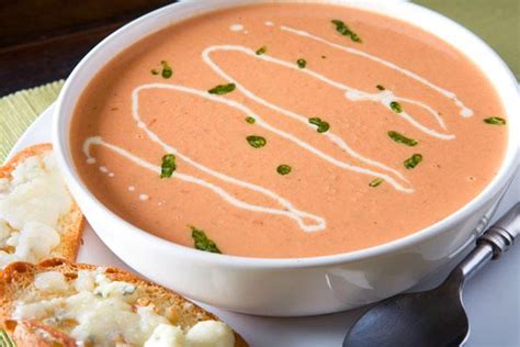 tuscan-tomato-bisque-with-roasted-garlic-cream-and image