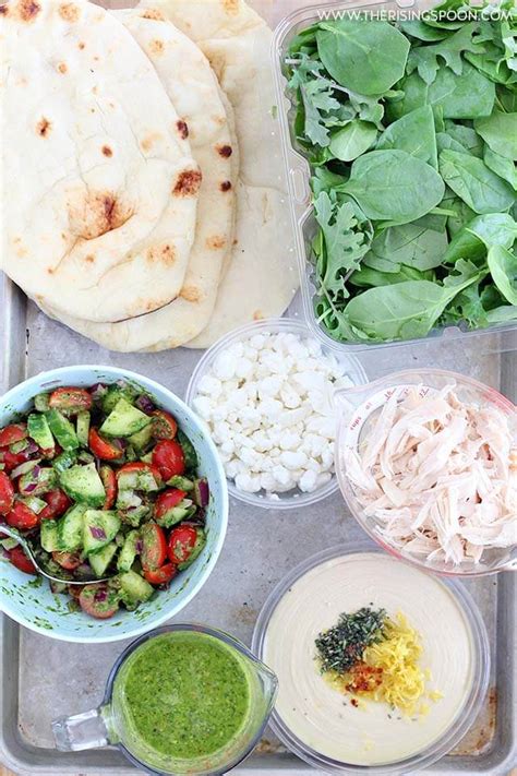 chicken-wraps-with-hummus-goat-cheese-chimichurri image