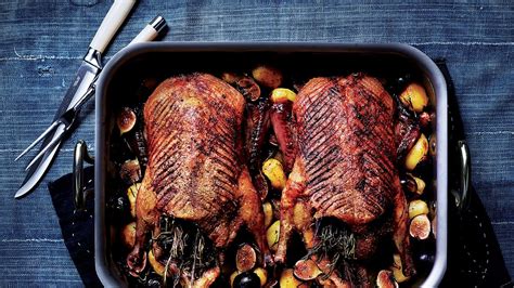 roast-ducks-with-potatoes-figs-and-rosemary image