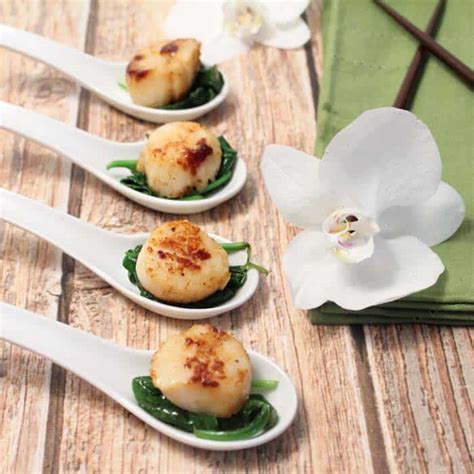 seared-sea-scallops-over-garlic-spinach-2-cookin-mamas image
