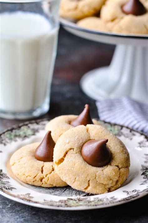 soft-and-chewy-peanut-butter-blossoms-the-seasoned image
