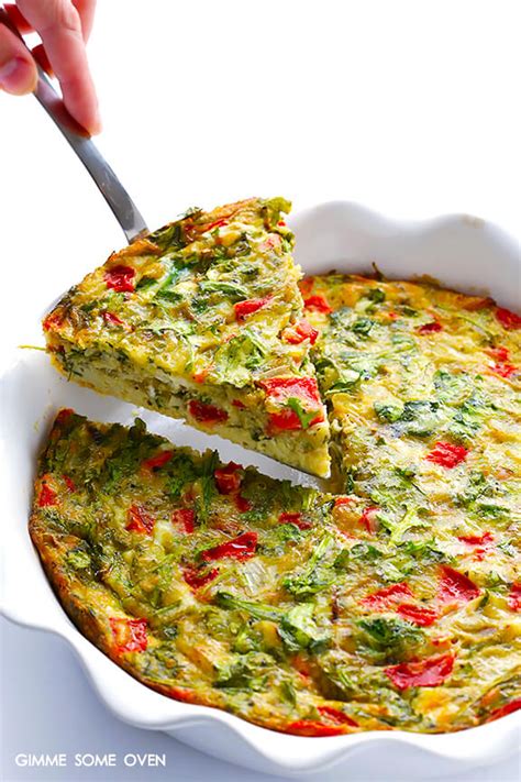 baked-frittata-with-roasted-red-peppers-arugula-and-pesto image