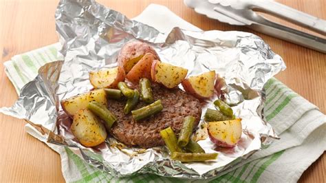 seasoned-burger-and-potato-foil-packs-recipe-pillsburycom image