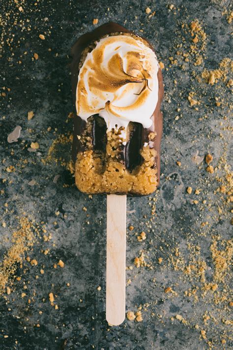 smores-popsicles-with-toasted-marshmallow-meringue image