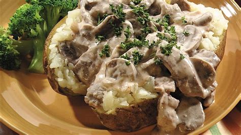 slow-cooked-beef-stroganoff-topped-potatoes image