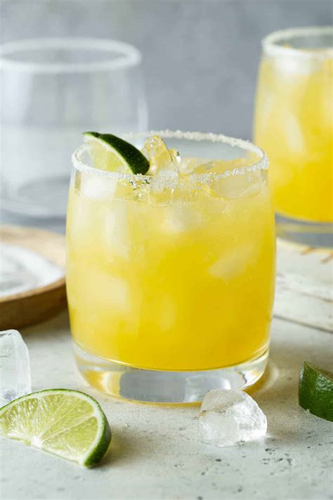easy-mango-margarita-recipe-garnish-with-lemon image
