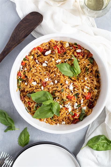 orzo-with-sun-dried-tomatoes-and-feta-island-bakes image