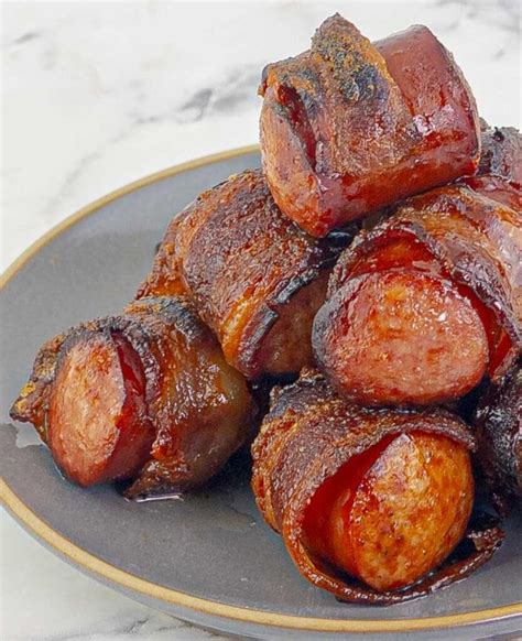 bourbon-brown-sugar-bacon-wrapped-sausages image